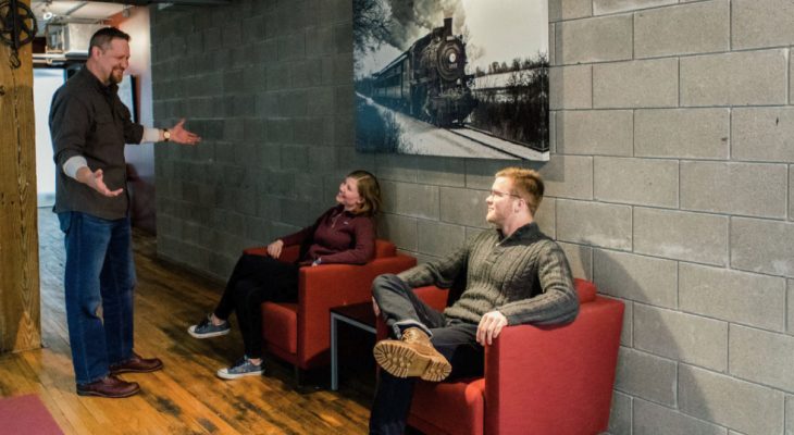 ClaimDOC office with people talking