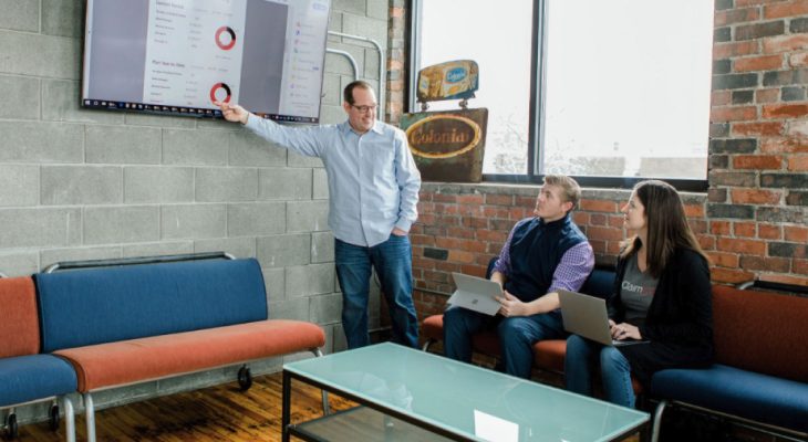 ClaimDOC office with people talking