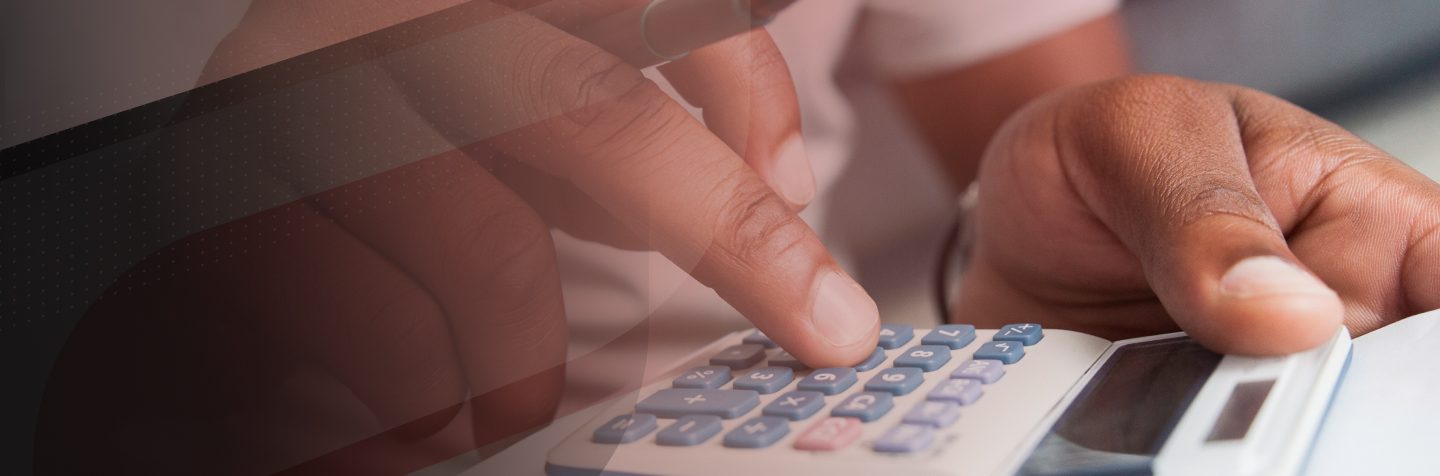 Man using calculator